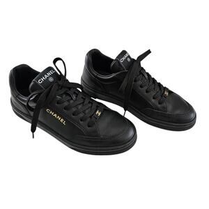Chanel 23A CC Logo Calfskin Sneakers Size 38 US 7 7.5 Black Leather Gold Lace Up